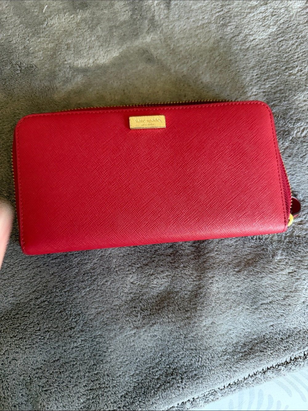 kate spade red zip-around wallet with gold plaque